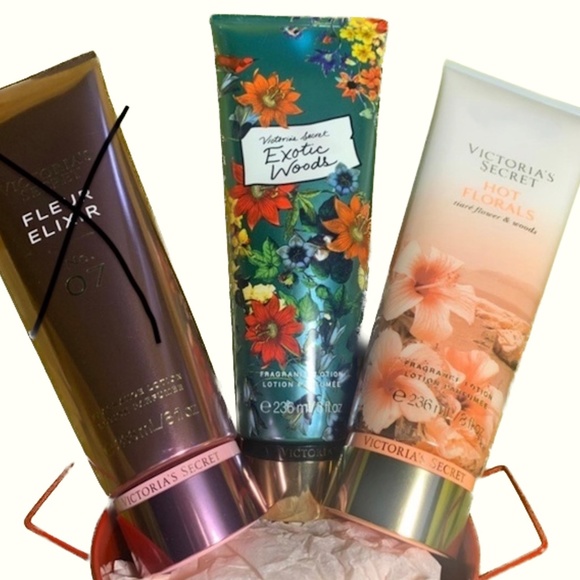 Victoria's Secret Other - Victoria secret lotion bundle of 2 NWT  (Exotic Woods, Hot florals)